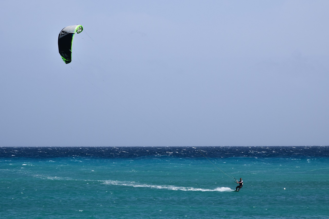 Lone kiteboarder riding a wide open Texas bay