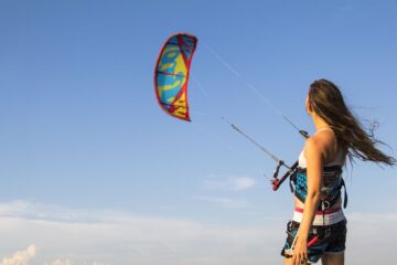 Beginner practising kite control on the beach before going in the water